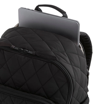 Black quilted backpack with a laptop compartment on a white background